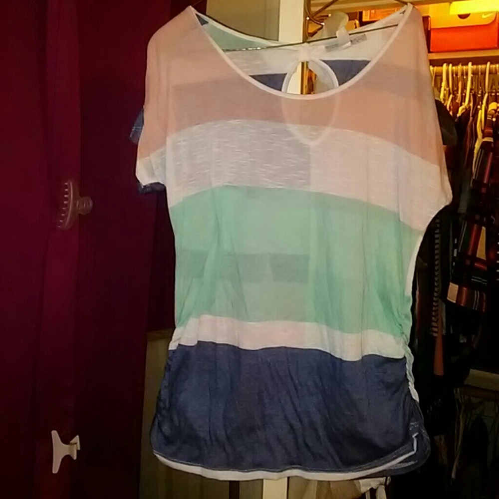 A blouse with a open back with a bow